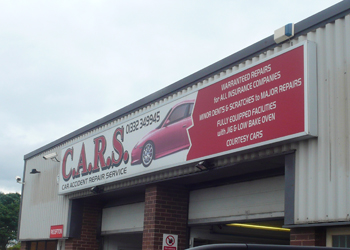 Large illuminated sign in Derby