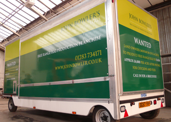 large vehicle wrap using full colour vinyl lettering